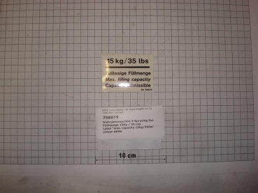 Label "max. capacity 15kg/35lbs" colour white