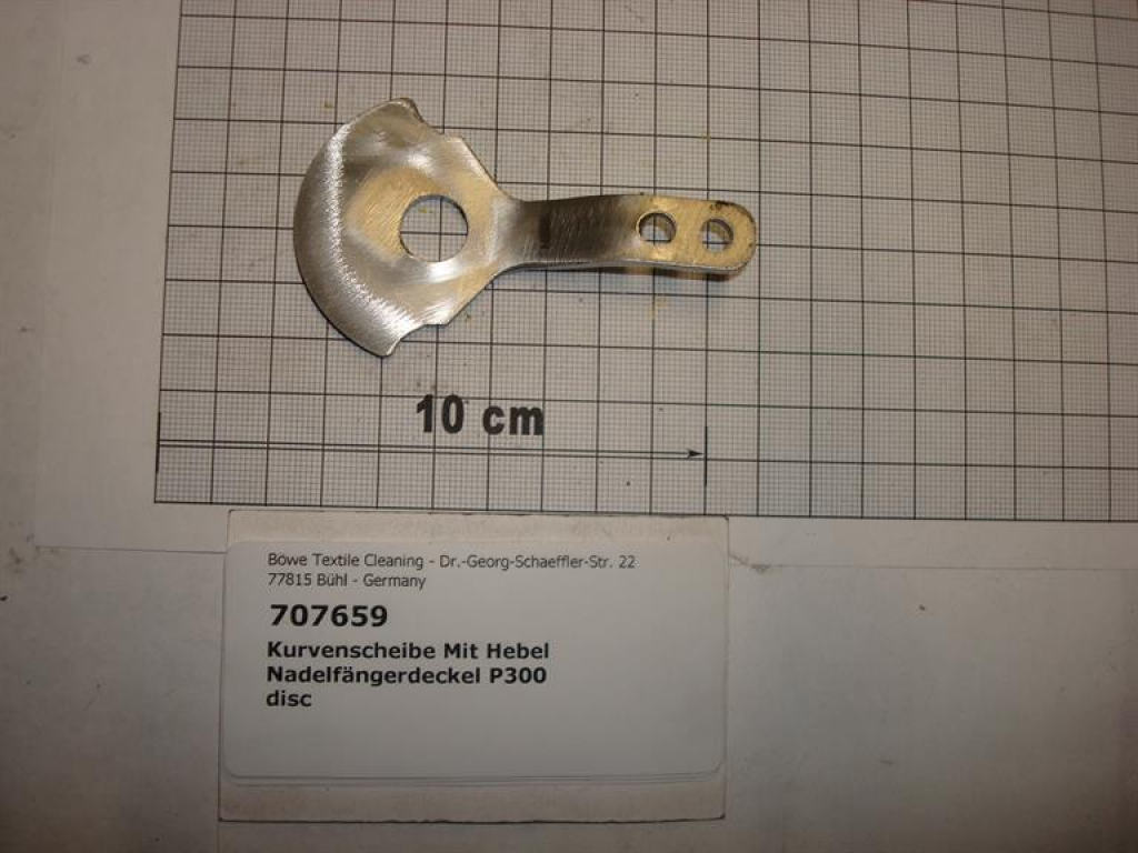 Curved disc with lever for button trap, all machines