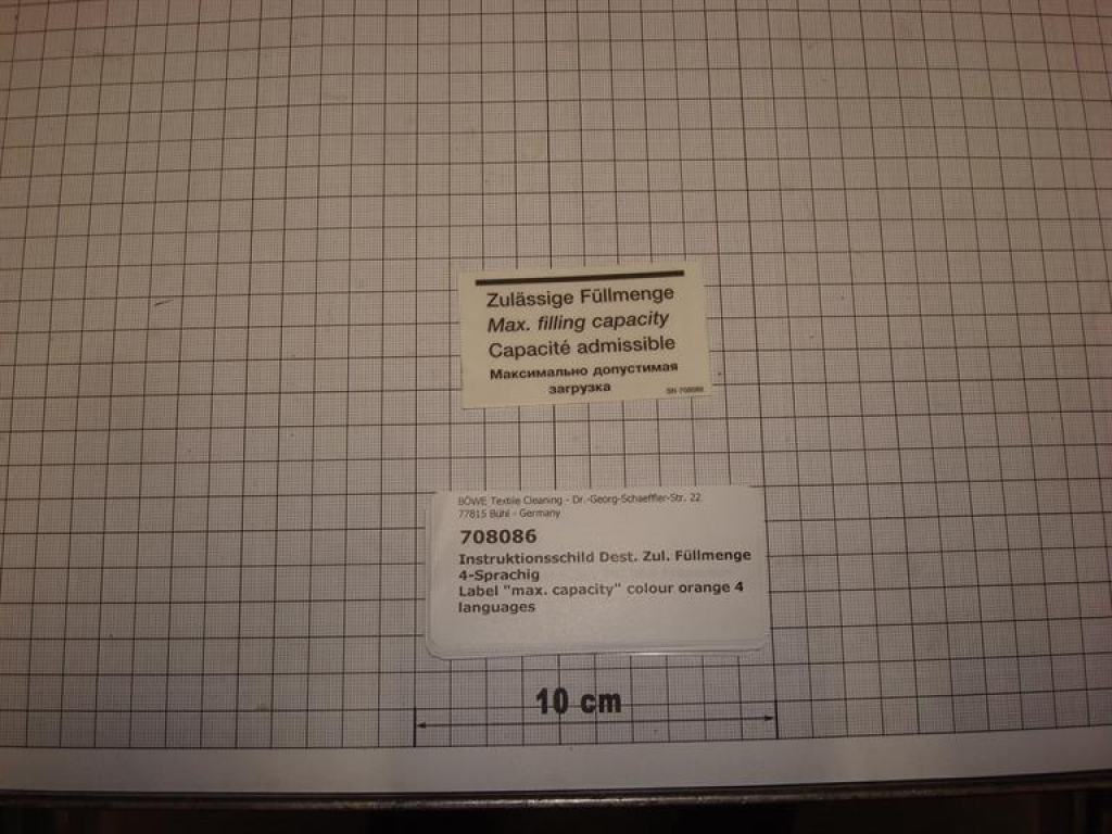Label for distillation"max. capacity" colour orange 4 languages